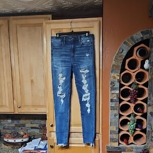 American Eagle Distressed Blue Next Level Stretch Super Hi-Rise Jegging Jeans